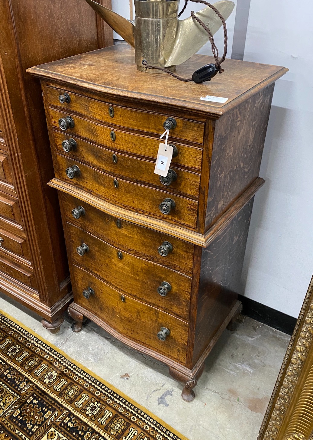 An early 20th century serpentine front oak canteen chest, width 56cm, depth 43cm, height 102cm